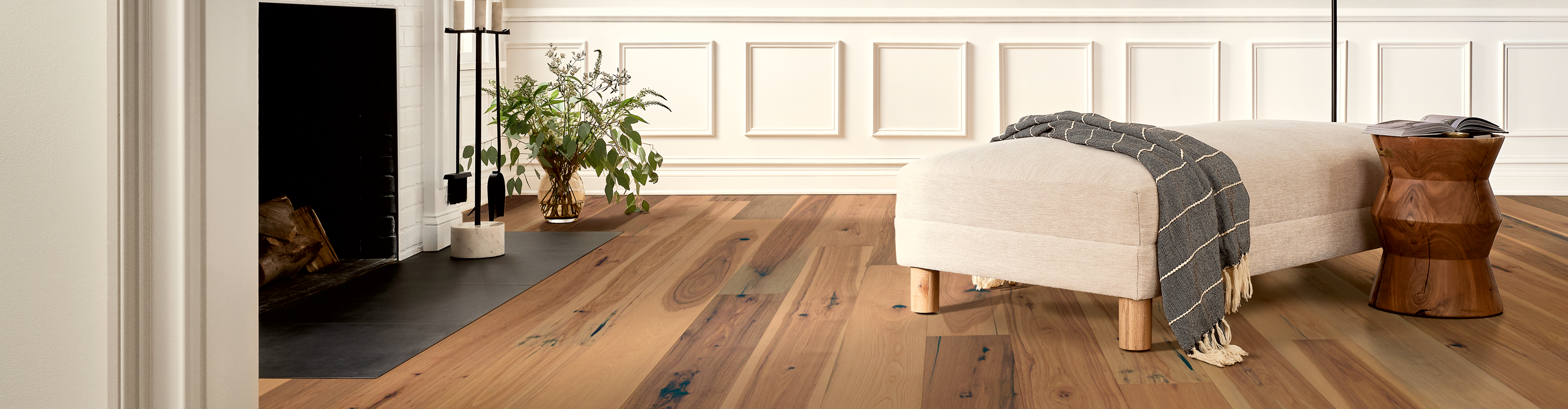 knotted hardwood flooring in medium tone installed in living room